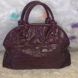 Oscar de la Renta eggplant colored bag